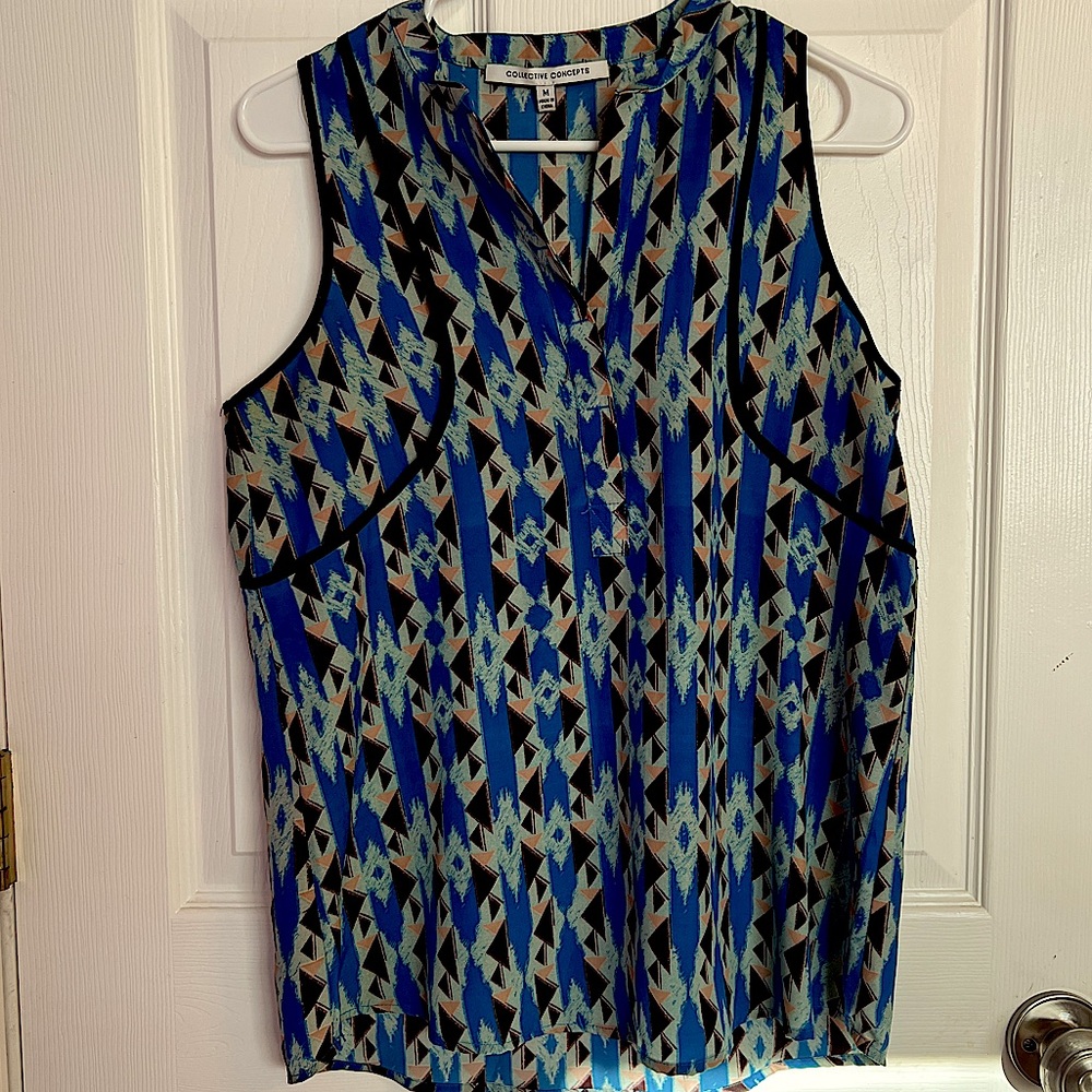Collective concepts sleeveless blouse geometric pattern.   Size medium.